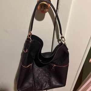 Authentic Louis Vuitton black leather Melie